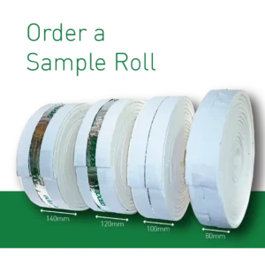 A group of rolls of paper on top of green background.