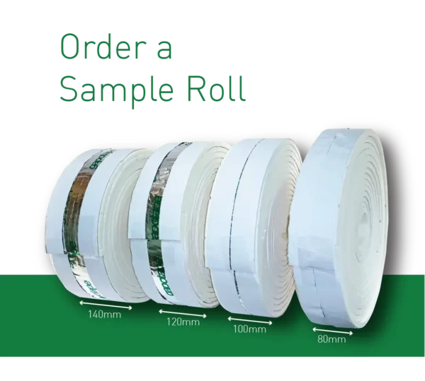 A group of rolls of paper on top of green background.